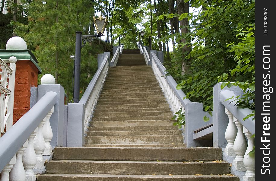 Stairway in ancient style with white balusters