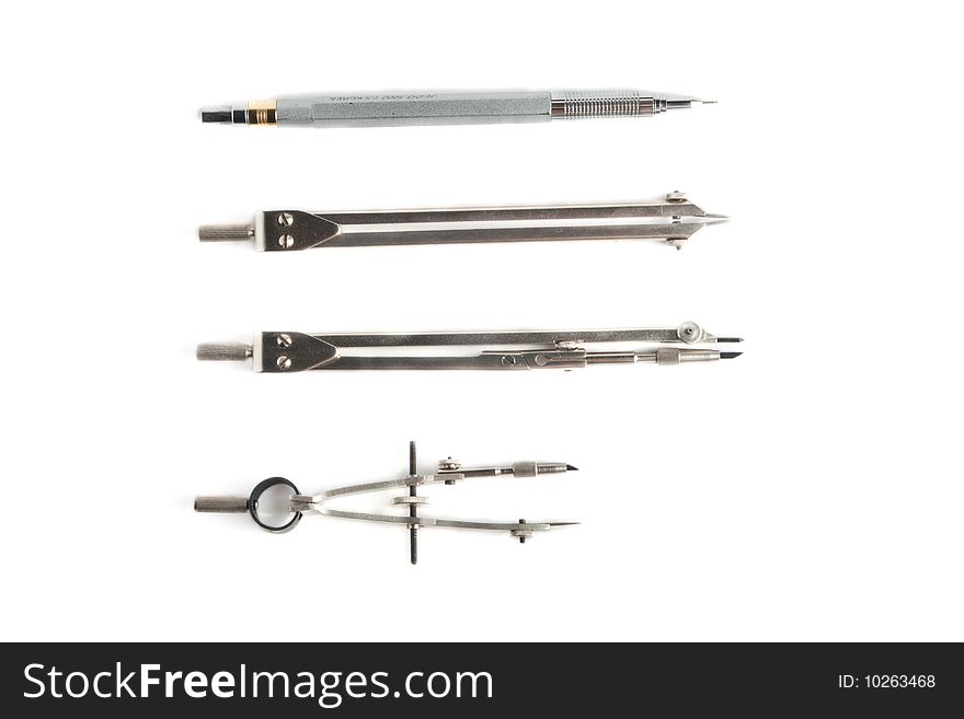 Three compasses and pencil on a white background. Three compasses and pencil on a white background