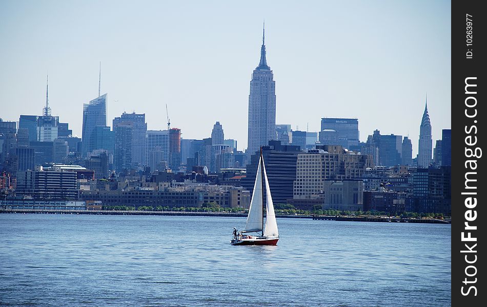 Lonely sail in bay of  New York.