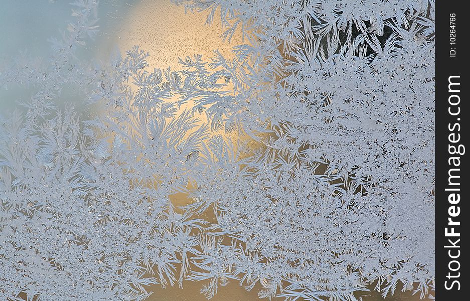 Photo of the frosty design on the window. Photo of the frosty design on the window