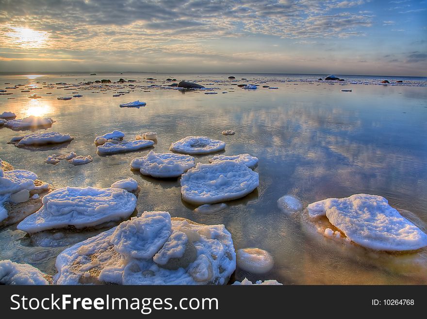 Landscape with winter sea under sky with clouds. Landscape with winter sea under sky with clouds