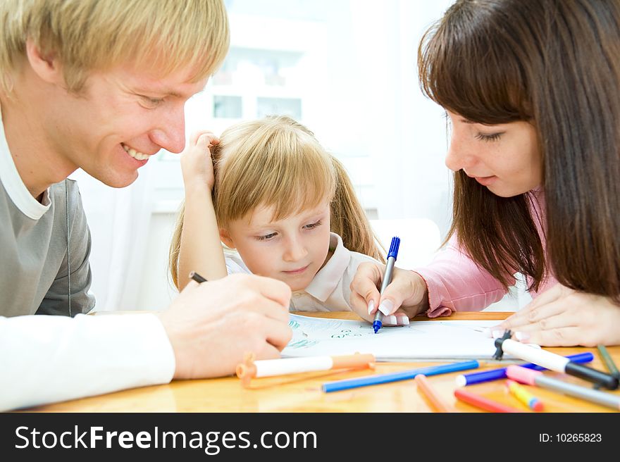 A mother, a father and a daughter drawing. A mother, a father and a daughter drawing