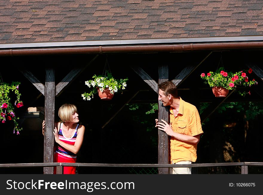 Young couple on wooden terrace