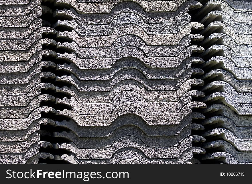 Particular pile of cement roof tiles