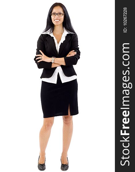Attractive businesswoman standing on a white background with hands crossed