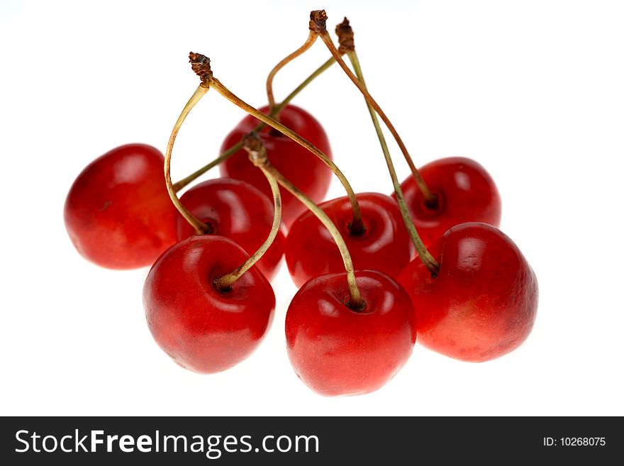 Red sweet cherry on a white background