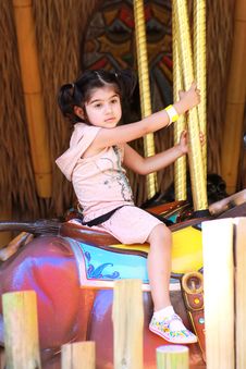 Girl In Merry Go Round Royalty Free Stock Photography