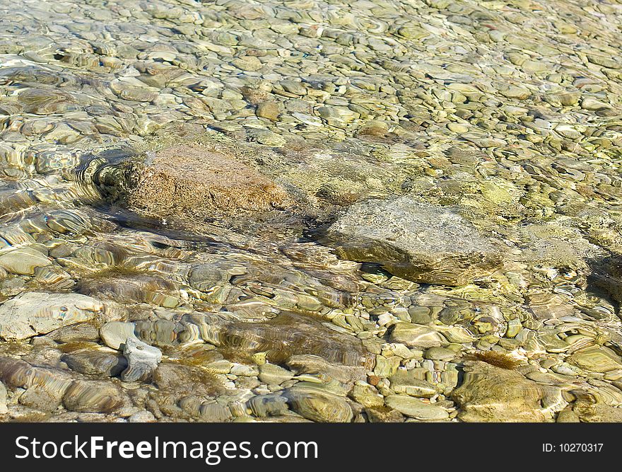 Pebbles under water