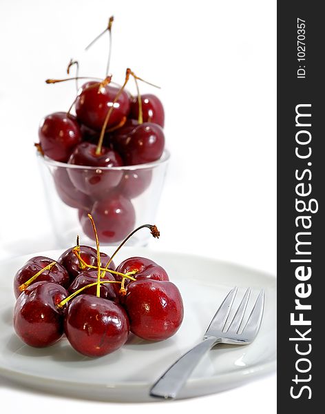 Fresh Cherry Fruit on plate with White Background. Fresh Cherry Fruit on plate with White Background