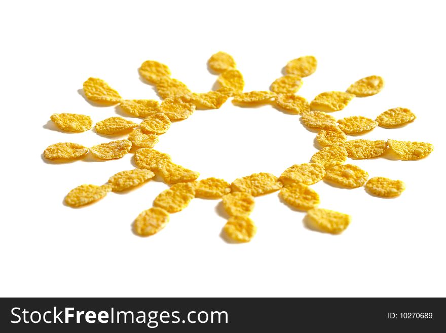 Corn flakes sun symbol isolated over white background. Corn flakes sun symbol isolated over white background