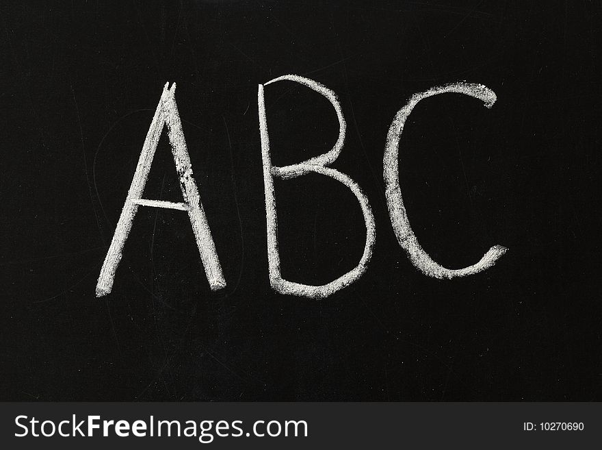 ABC letters on the blackboard macro shot