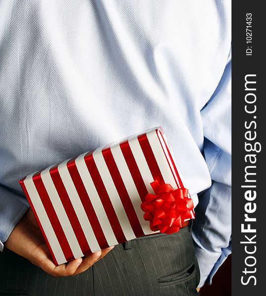 Businessman Hiding A Gift