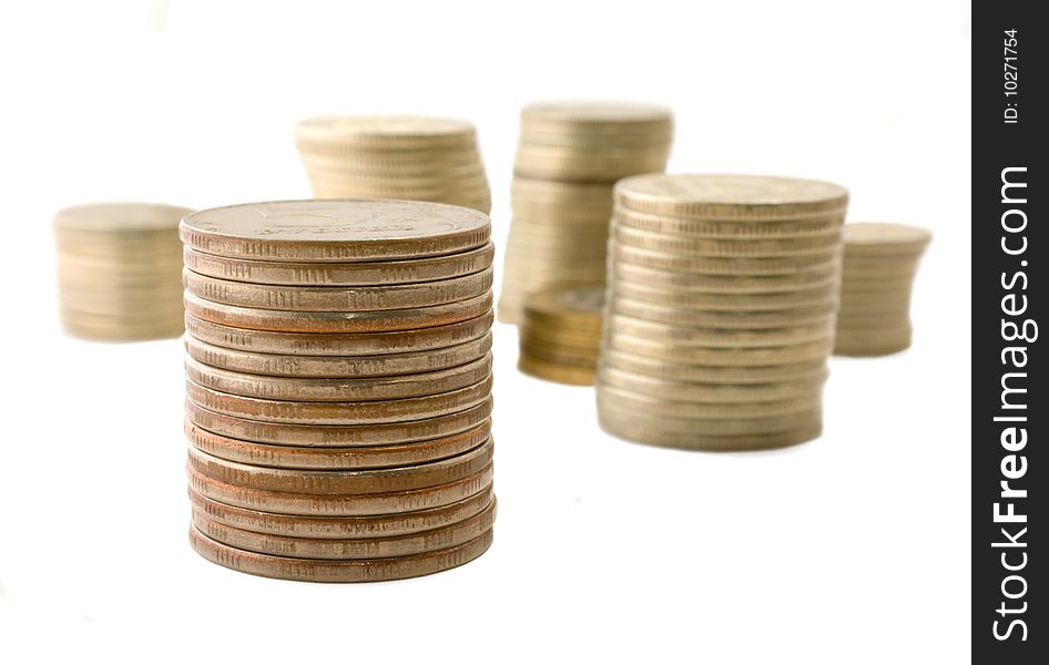 Isolated coins on white background.