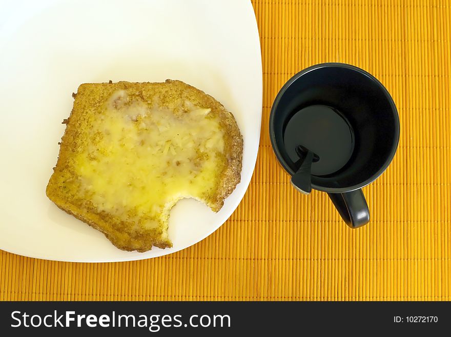 Bread, cup of tea served nicely. Bread, cup of tea served nicely