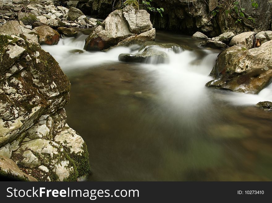 River in the forest, slow shutter photo