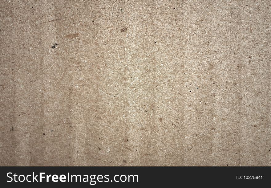 Texture of coarse gray cardboard close up