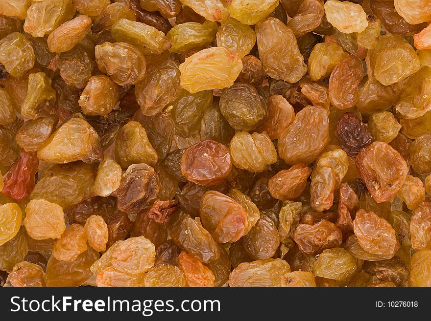 Texture of golden raisins, for the background of close-up