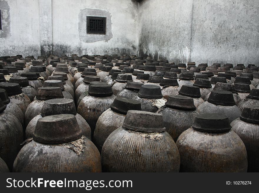 Some ceramic tanks of distilled spirit