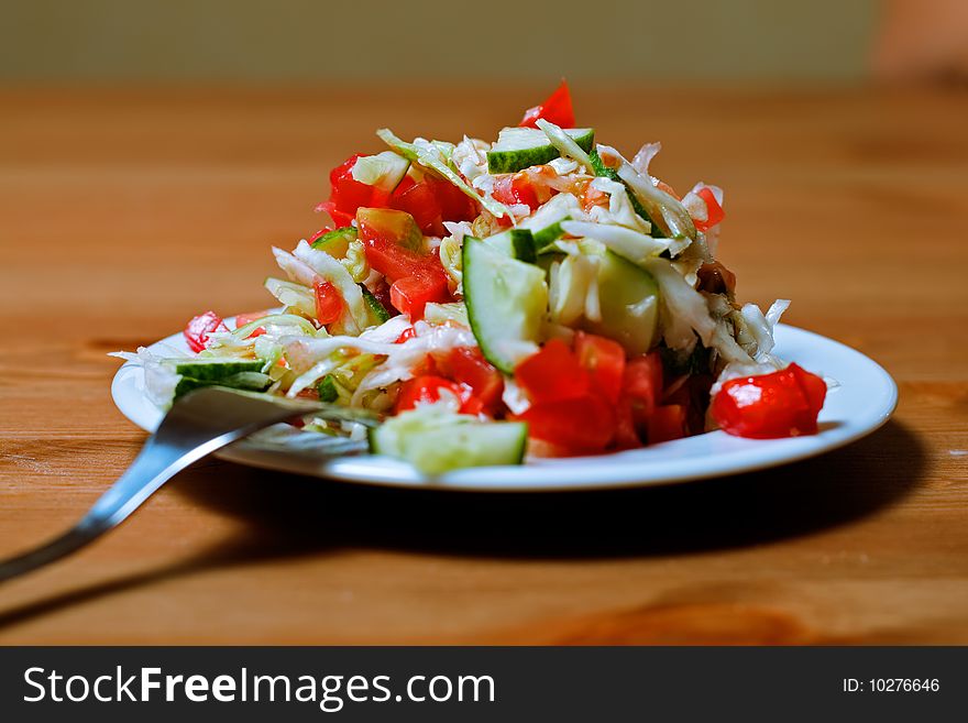 Salad with fresh red tomatoes. Salad with fresh red tomatoes