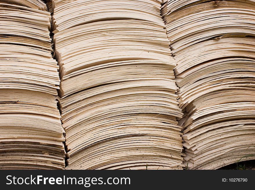 Close up to pile of wooden shingles