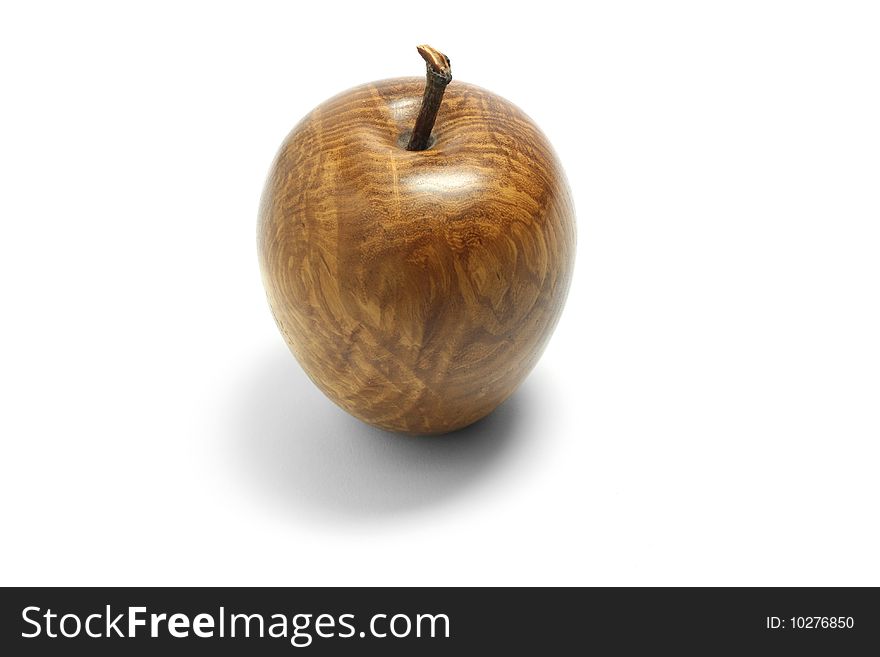 Apple made of wood isolated on white. Apple made of wood isolated on white