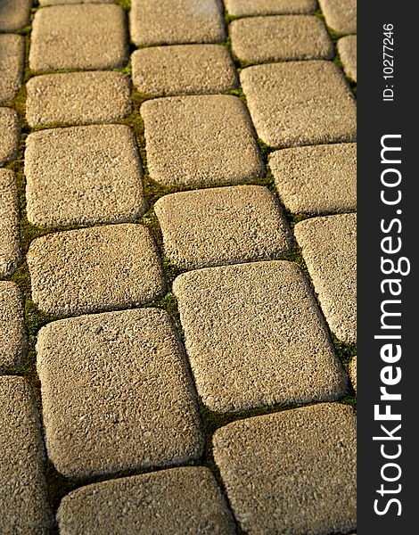 Pavement stones in the light of setting sun