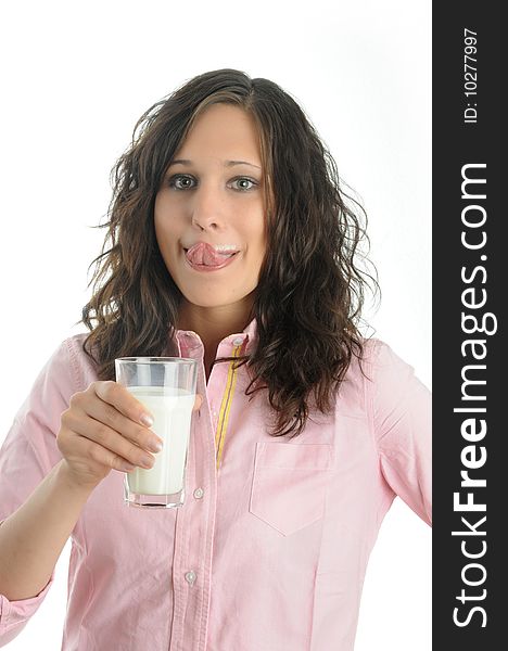 Young woman drinks milk,isolated over white.