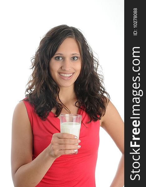 Young woman drinks milk. Isolated over white.