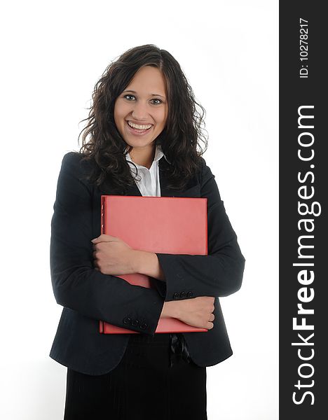 Young, successful business woman carrying red folder.