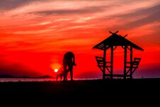 Blur Of Sunset Background ,man With Dog And Little Hut Stock Image Blur Of Sunset Background ,man With Dog And Little Hut Stock Image