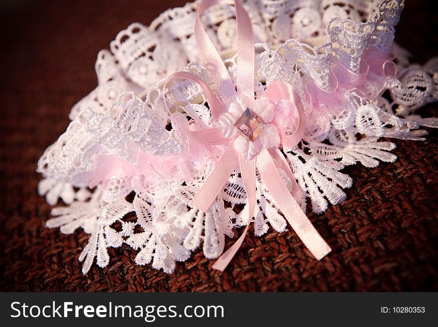 Pink garter of the bride