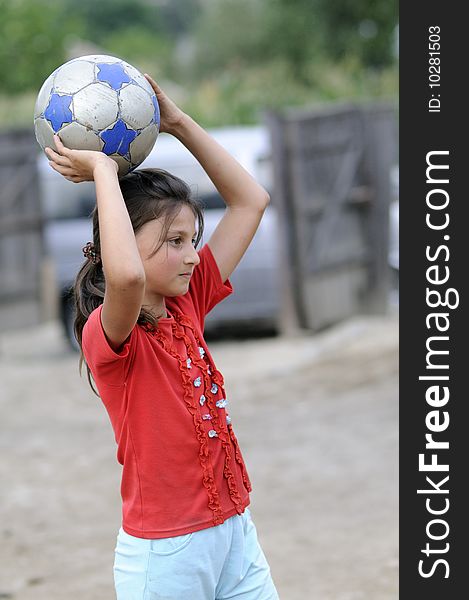 Beautiful girl playing with ball in nature. Beautiful girl playing with ball in nature