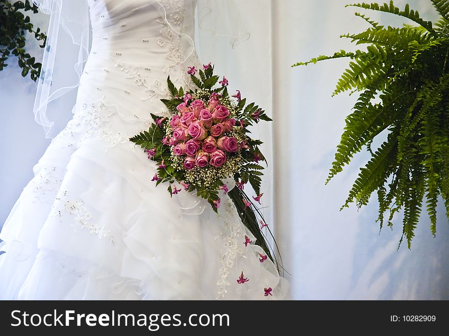 Beautiful white wedding gown with flowers