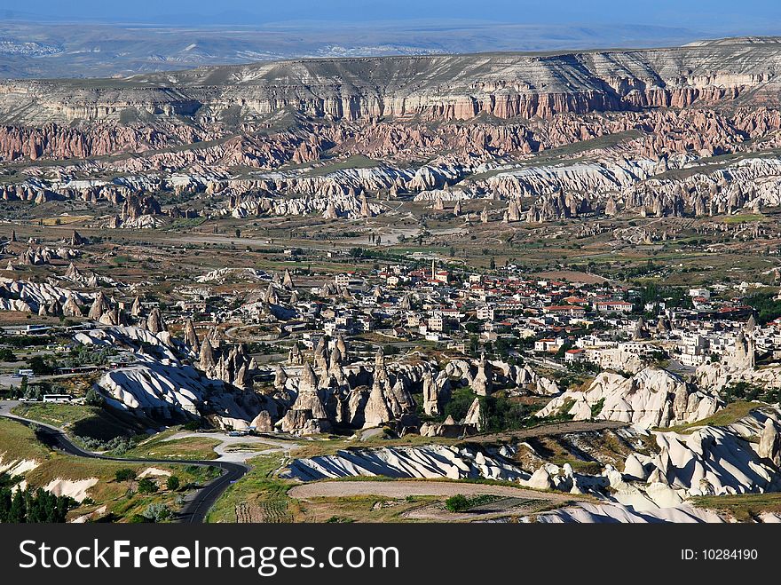 Goreme is a town in the Cappadocia region of Turkey. The town is centered in the middle of a internationally popular region that is best known for its natural rock formations, often called fairy chimneys. Goreme is a town in the Cappadocia region of Turkey. The town is centered in the middle of a internationally popular region that is best known for its natural rock formations, often called fairy chimneys.