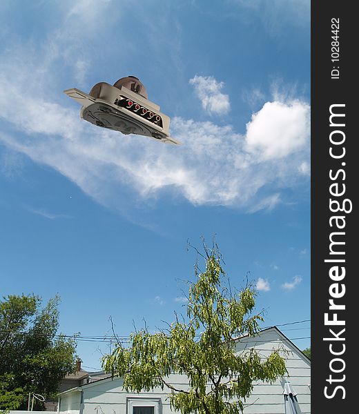 UFO scout ship hovering over a house.