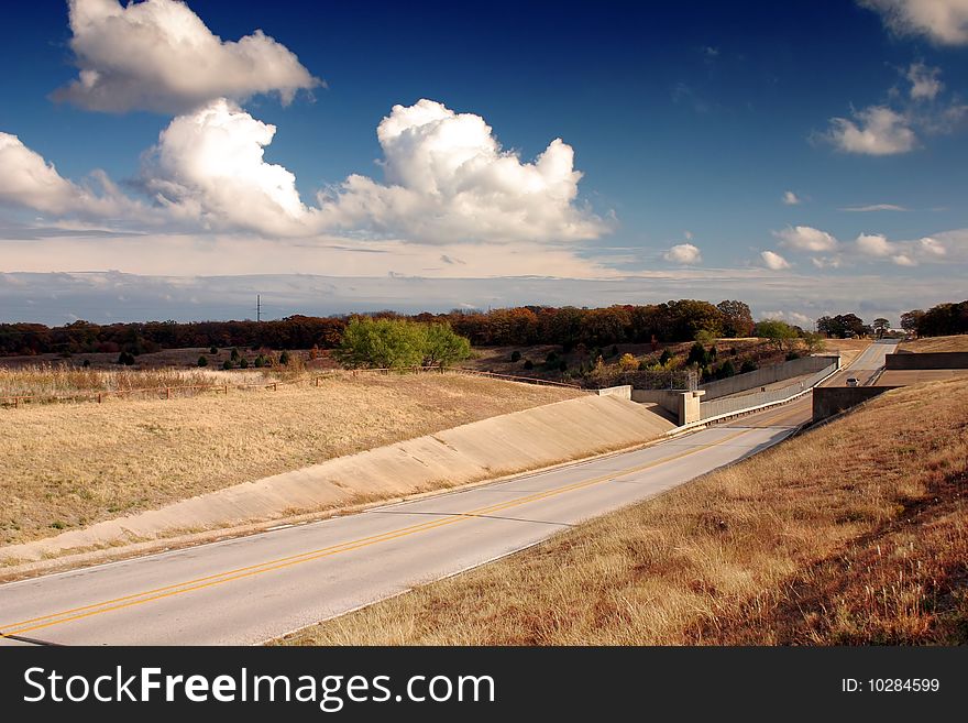 A country road with beautiful sky and scenery
