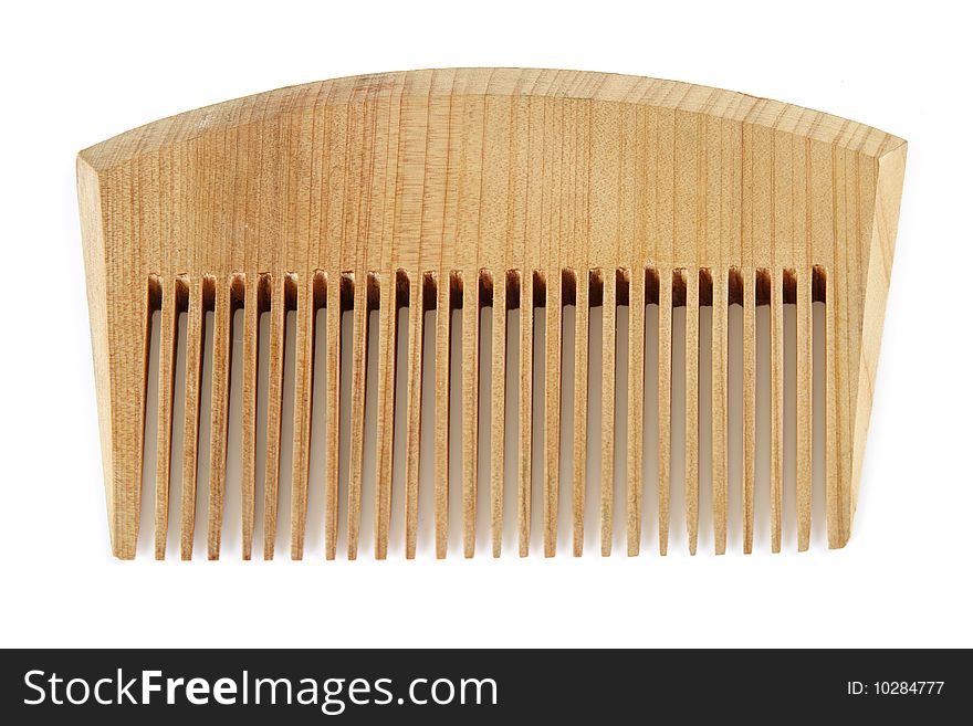 Handmaid wooden comb isolated on white