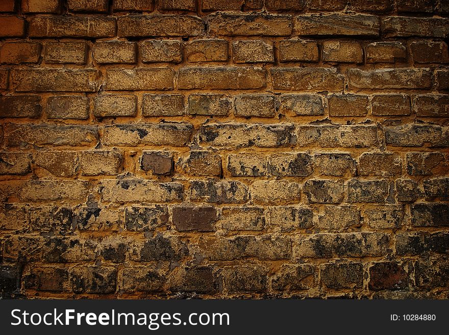 Destroyed old brick wall fragment. Destroyed old brick wall fragment