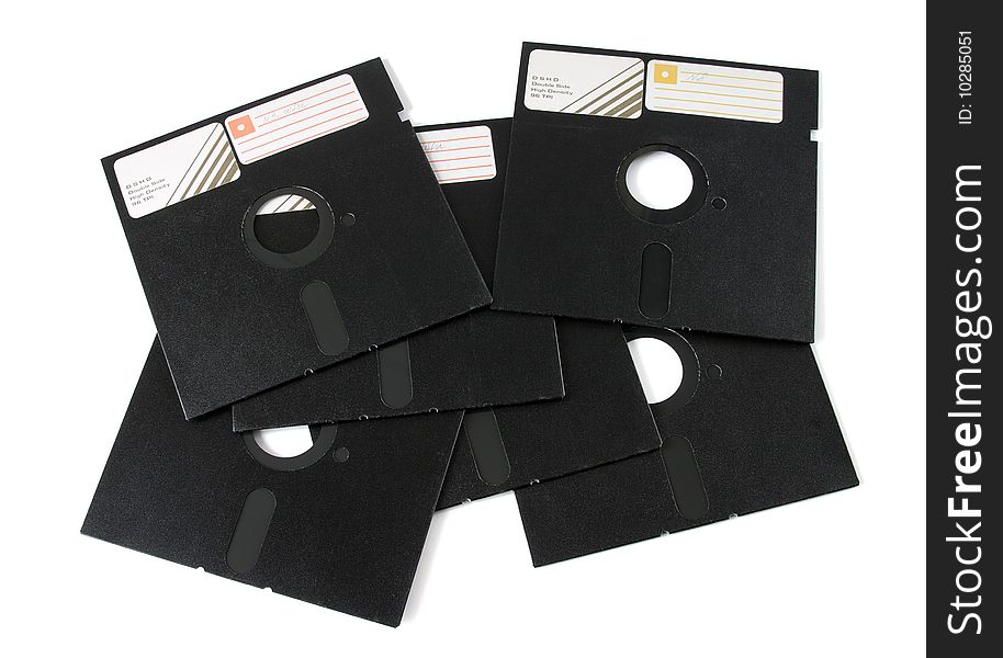 Some old floppy disks isolated on white