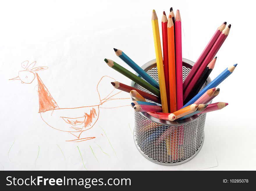 Chldren's drawing cock with color pencils isolated on whiye. Chldren's drawing cock with color pencils isolated on whiye