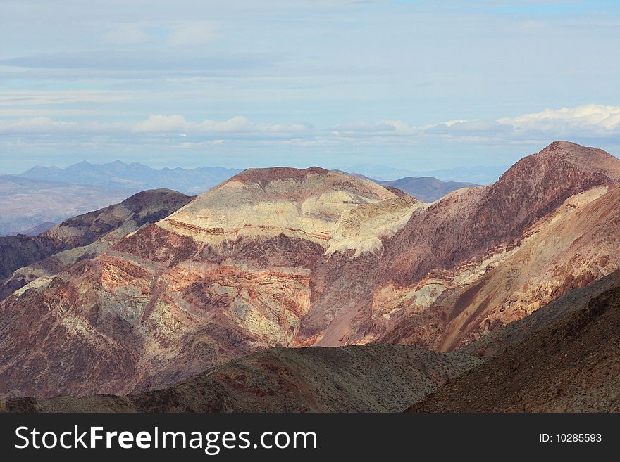 Multi-colored sandston mountains in the desert