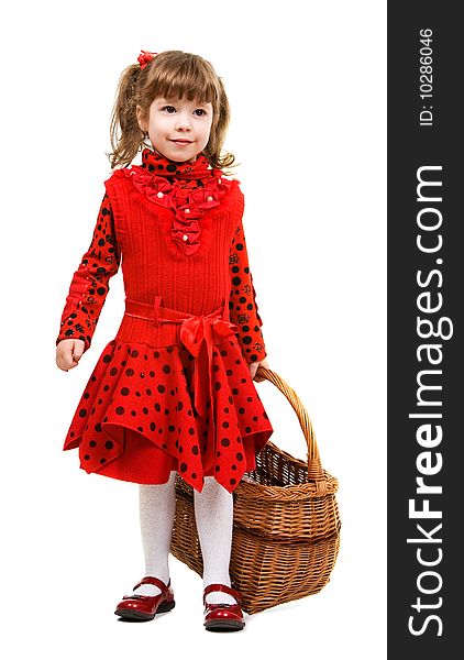 Beautiful little girl in red dress holding basket, isolated on white