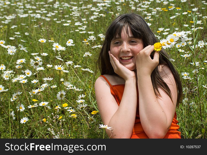 The portrait  of girl in the middle of flower