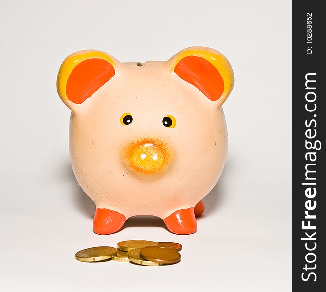 This is Piggy bank style money box isolated on a white background.