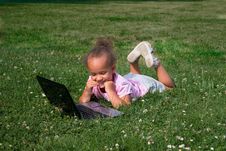 Young Girl In Green Grass With Laptop Computer Royalty Free Stock Image Young Girl In Green Grass With Laptop Computer Royalty Free Stock Image