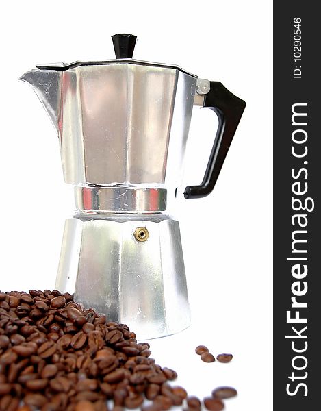 An espresso mug with coffee beans