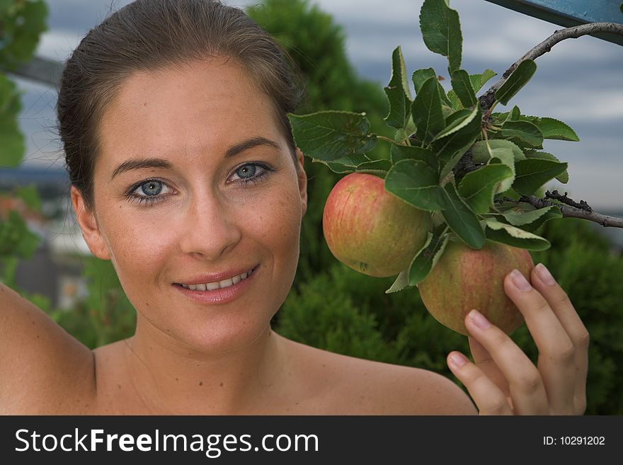 Young attractive Woman with apple