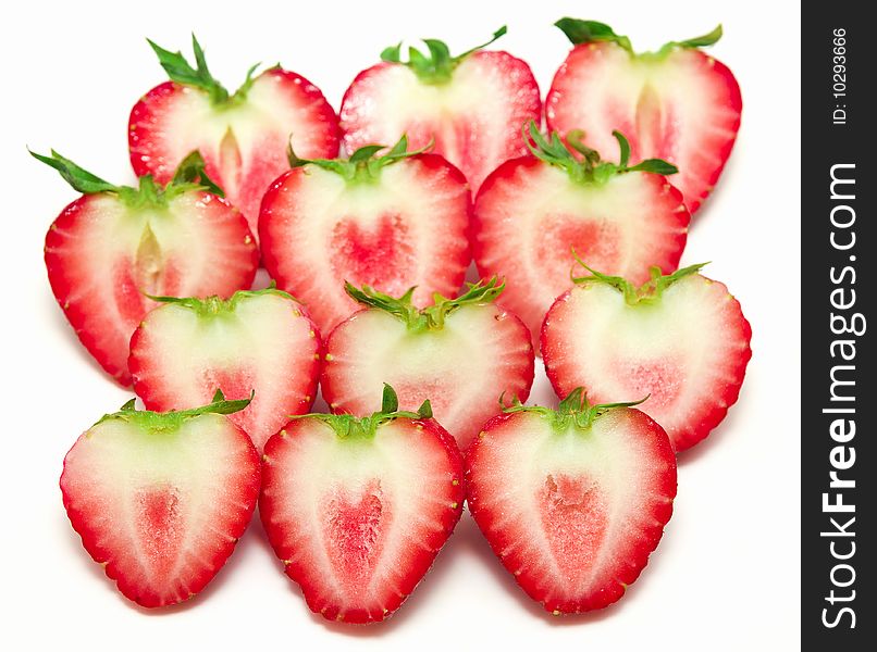 Sliced strawberries isolated in white