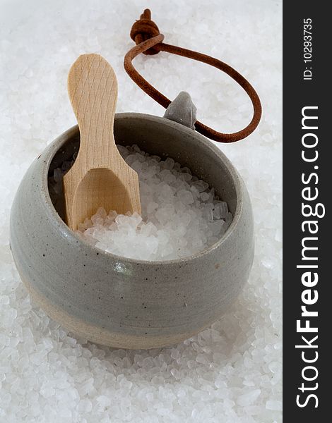 Pottery and salt with wooden spoon