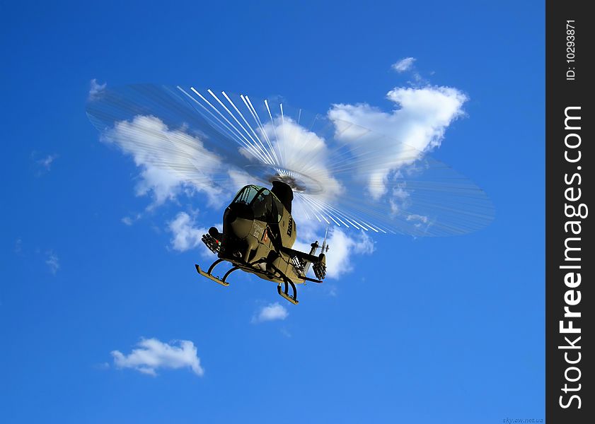Military helicopter on a background sky
